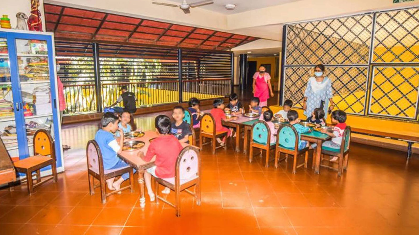 ADOPTION: Children having a meal in the dining area of our child care centre