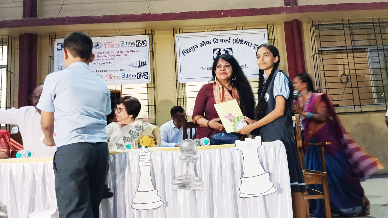 EVENTS: Trustee Leena Elizabeth Abraham awards certificates to students from our Rabale community centre at the FIDE rating tournament