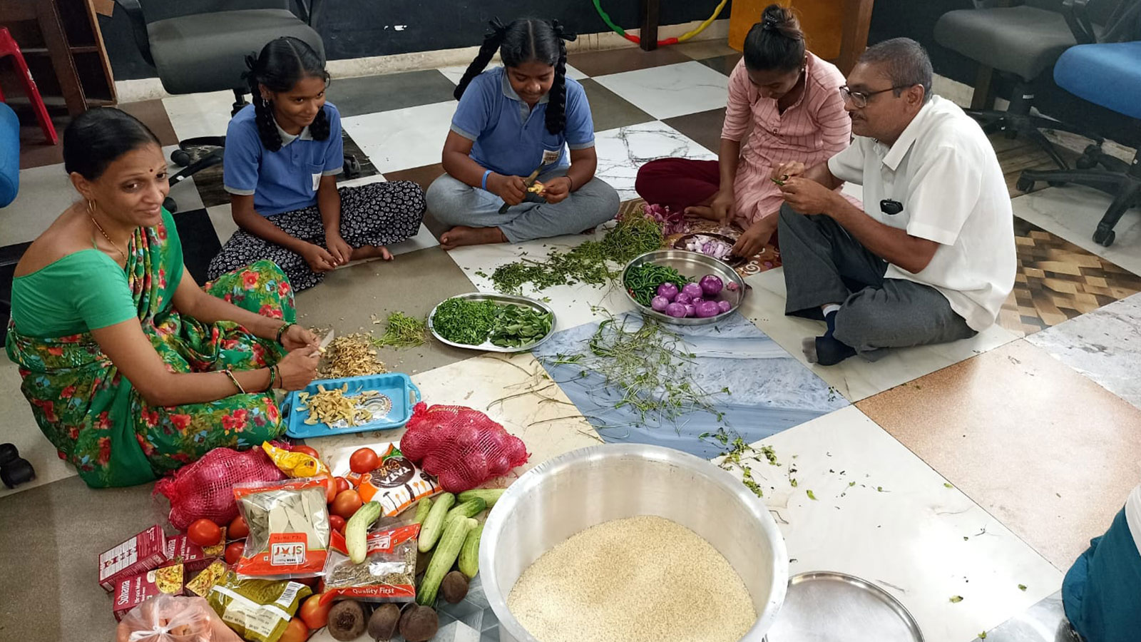 NUTRITION: Community cooking for Holi lunch at our Mahatma Gandhi Nagar Quarry community centre